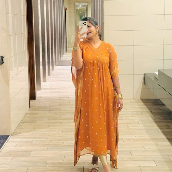 Photo shared by Thabu & Pathu on August 30, 2026 tagging @rose_jinish. May be a selfie of dress and text. Mustard Yellow Kaftans